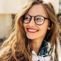 Woman smiling outside