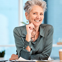 Woman smiling in an office